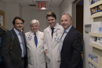 Andreas Dracopoulos, co-president of the Stavros Niarchos Foundation, with doctors of the Hospital for Special Surgery